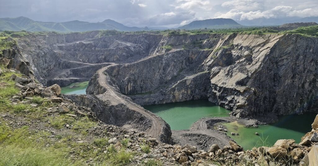 A breathtaking view of a quarry with emerald waters in Neem Ka Thana, Rajasthan.
